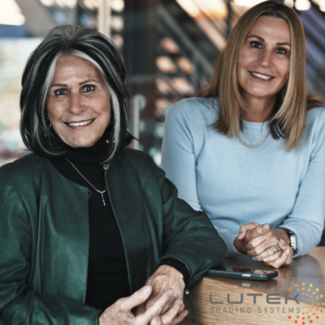 Mary Lou, founder of Lutek Shading Sytems on the left wearing green and Kelli Beckish, president, on the right with blue. Lutek is a Women's Business Enterprise